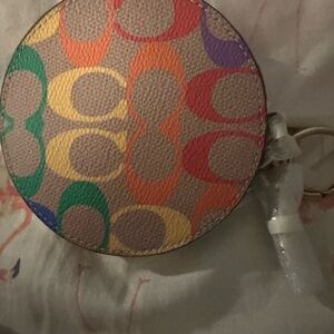 Coach Multicolor Coin Purse the measurement is 4 inches circle